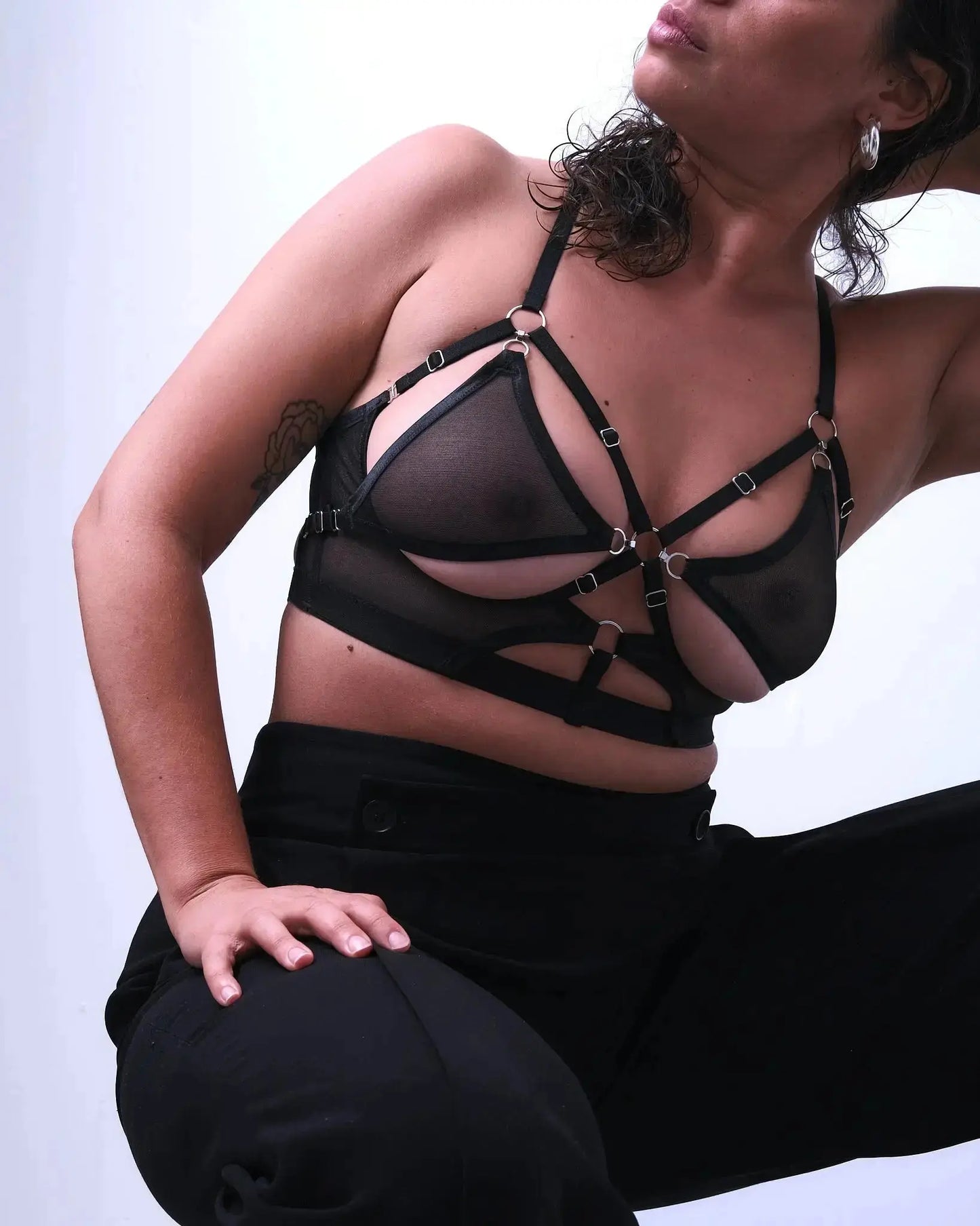 sexy lingerie with a harness-style fit, silver hooks, and recycled mesh fabric