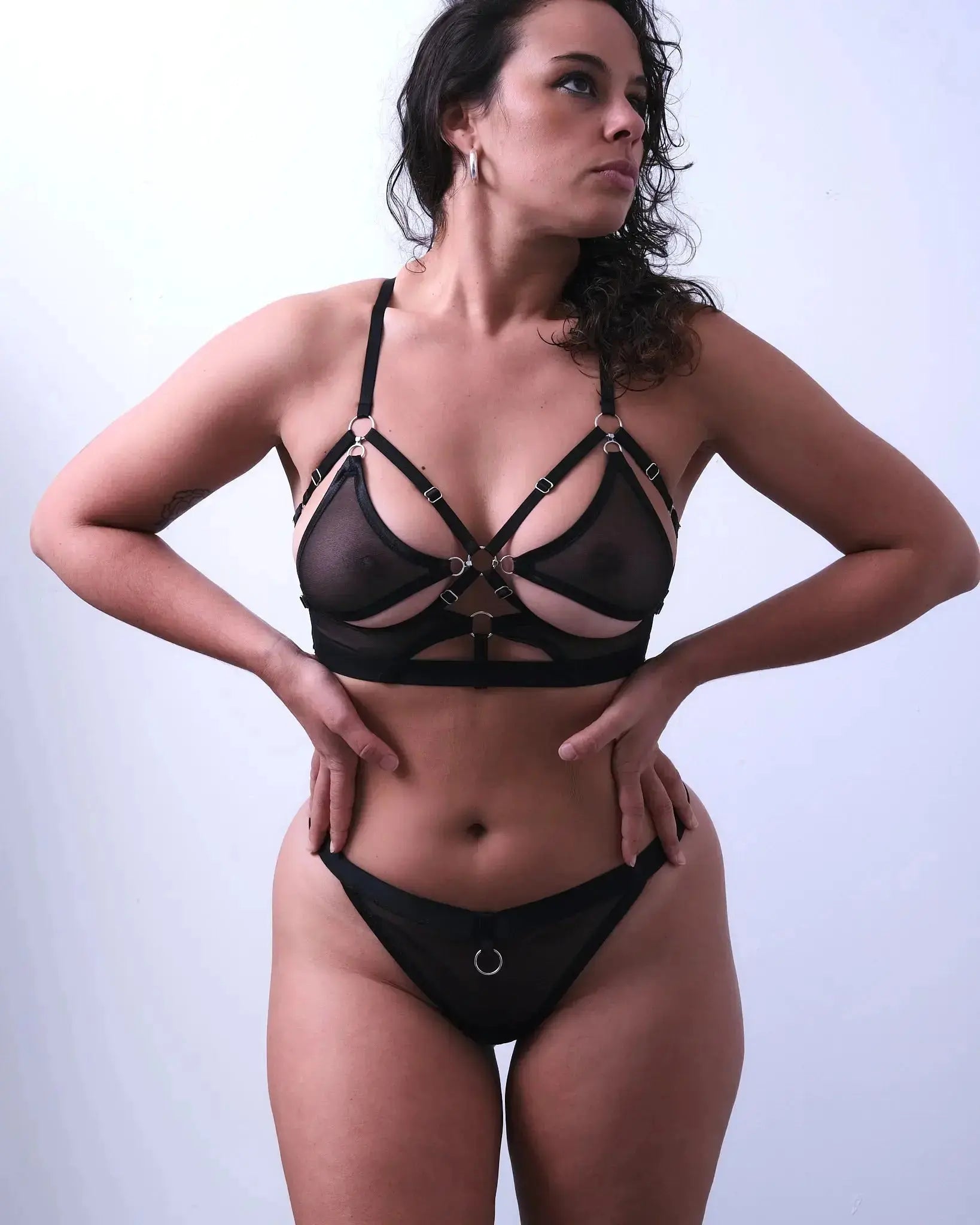 sexy lingerie with a harness-style fit, silver hooks, and recycled mesh fabric